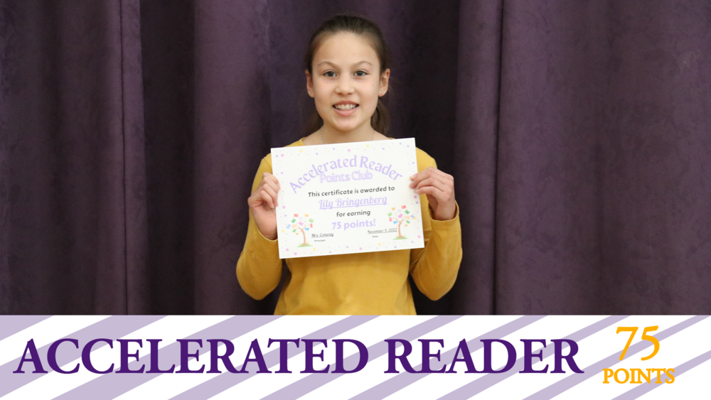 student holds up her certificate