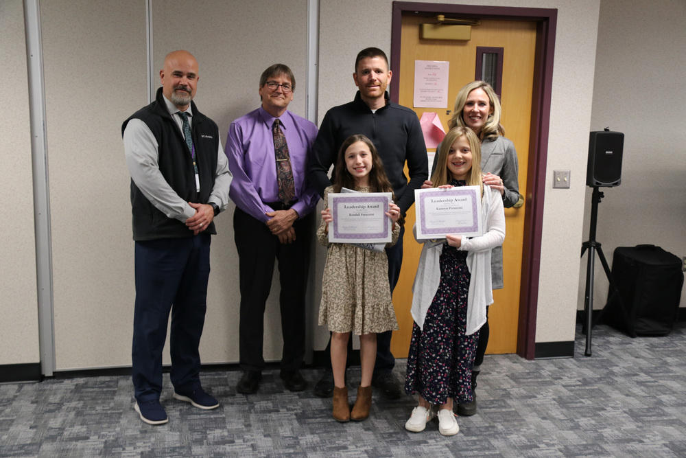 BOE award winners with their parents, superintendent and BOE president