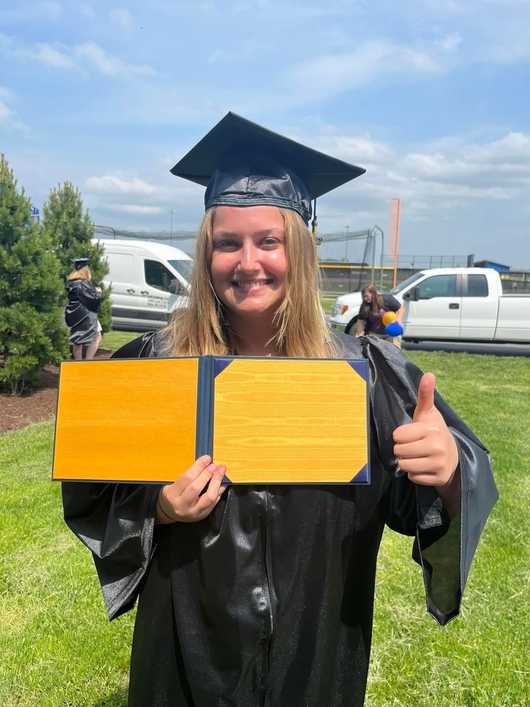 Harling shows off her diploma