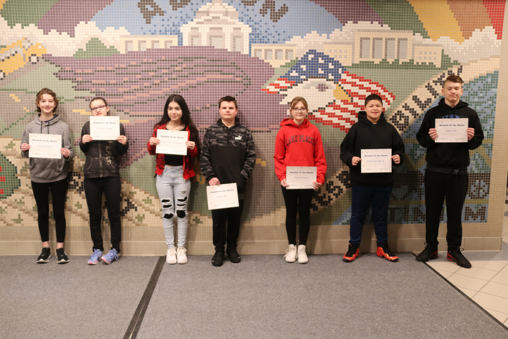 students of the month pose for a photo