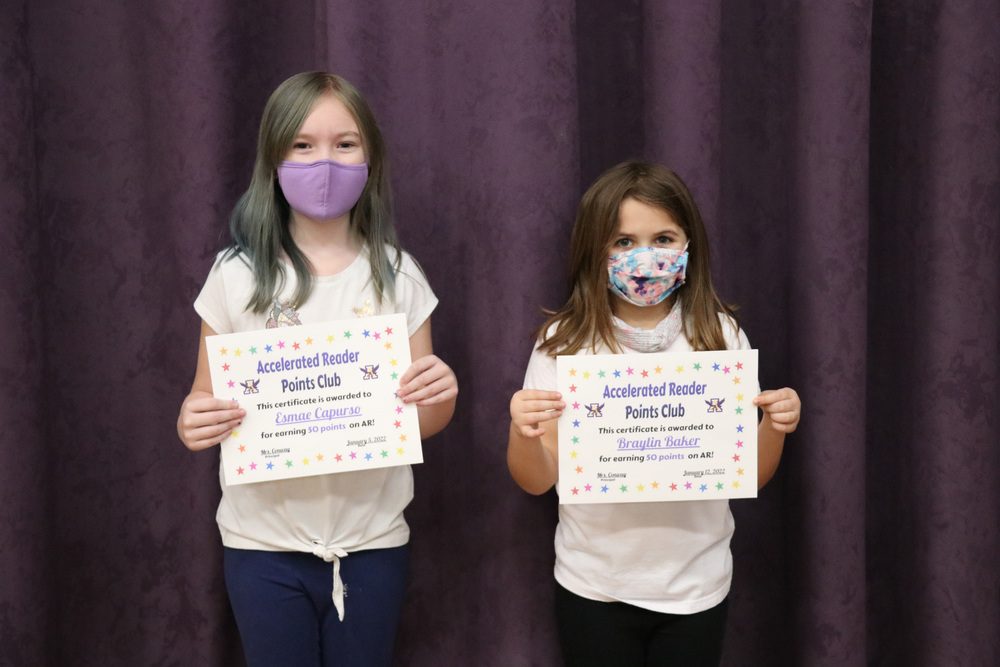 Students pose with their Accelerated Reader certificates