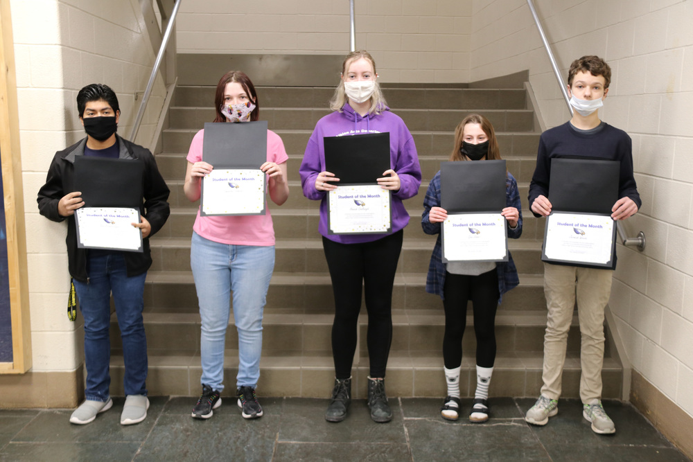 HS December students of the month pose with their certificates