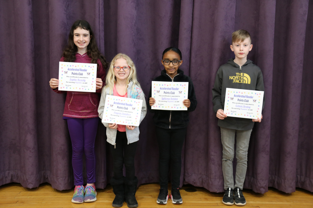 accelerated reader honorees pose with certificates