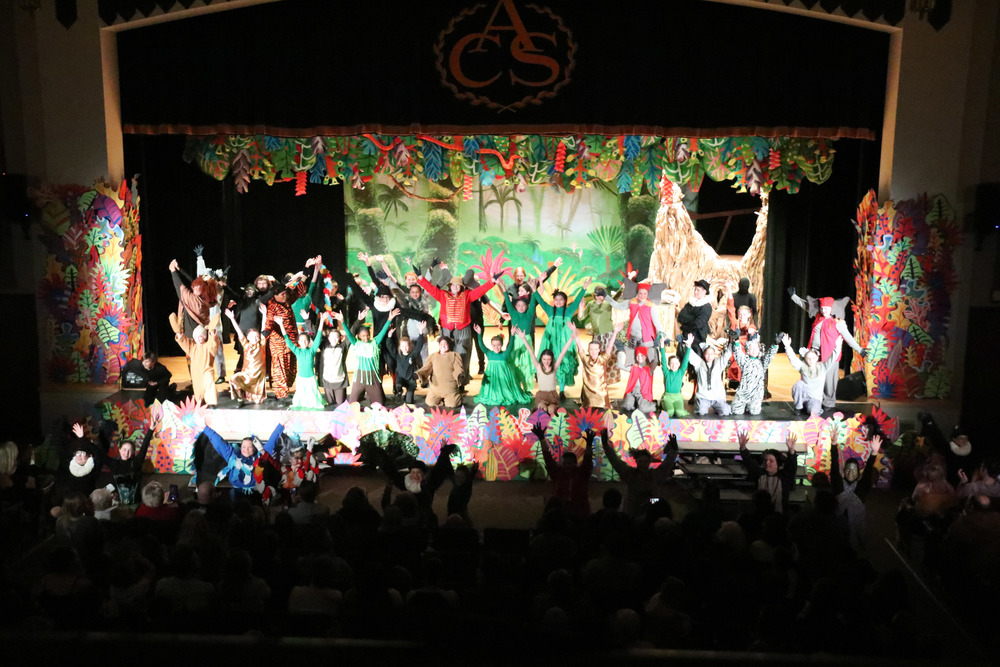 the cast of the Jungle Book on stage