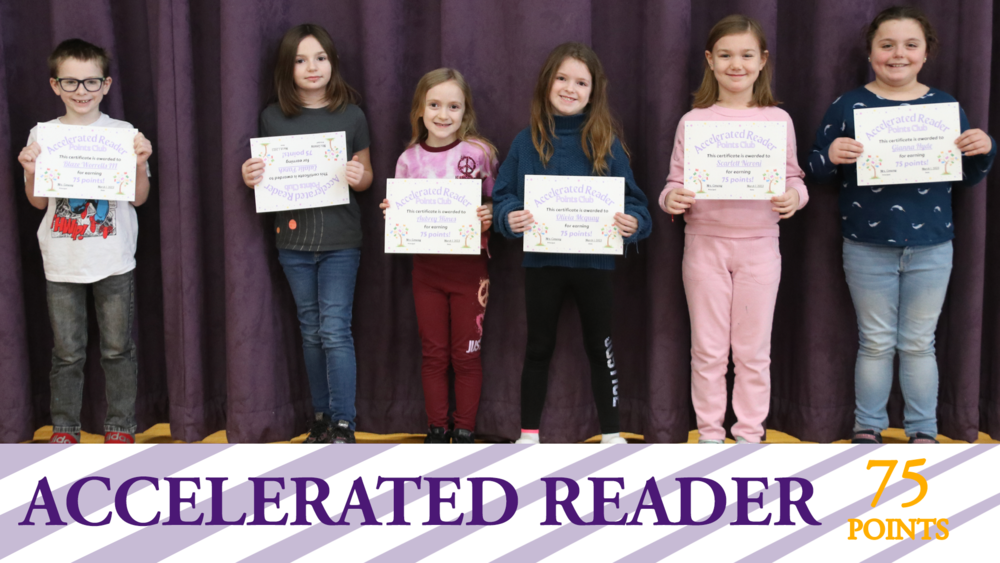 Accelerated Reader students holding their certificates