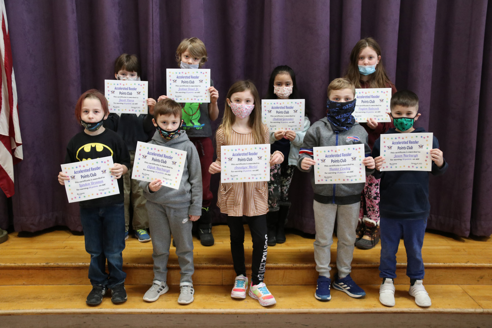 Accelerated Reader students pose with their certificates