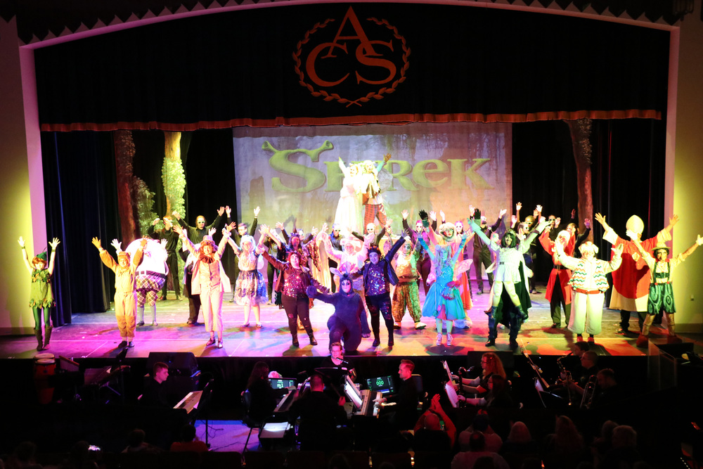 the  cast and orchestra of Shrek the Musical
