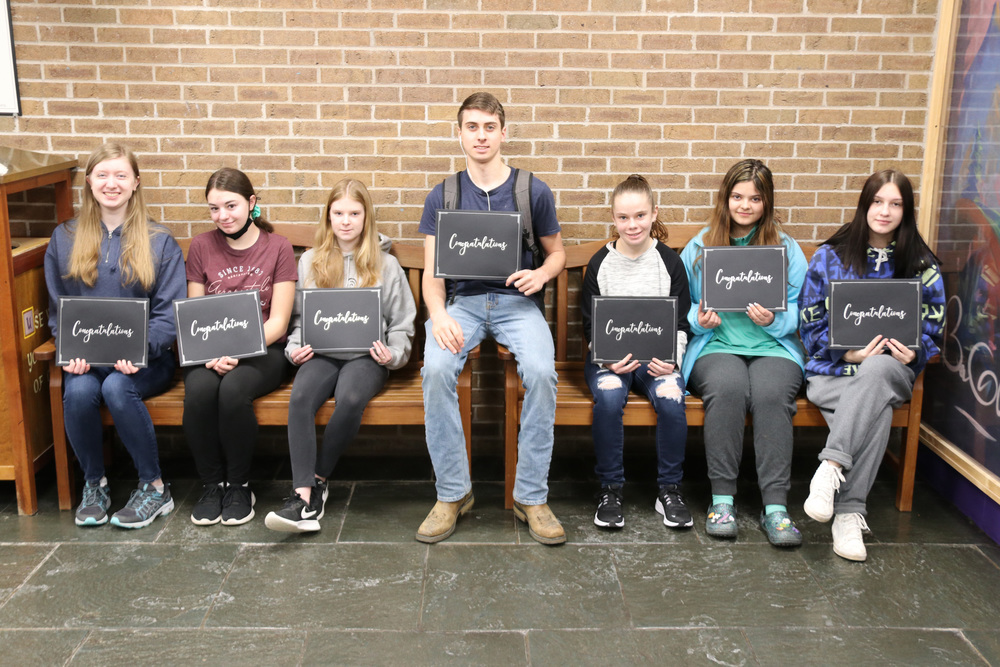 students of the month pose for a photo