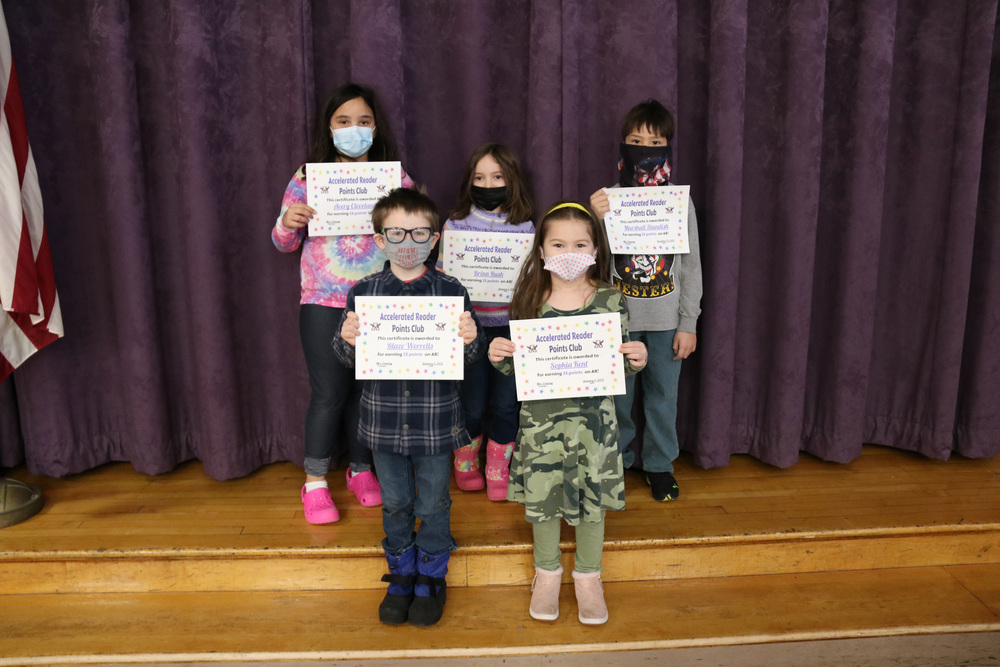 Students pose with their Accelerated Reader certificates