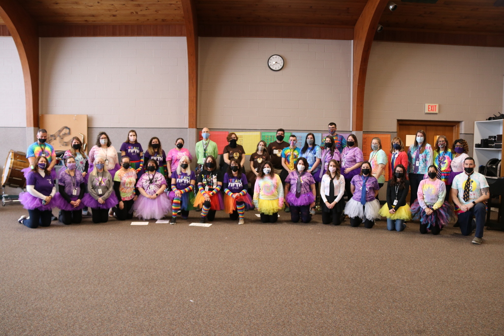 group photo of staff dressed up for 2-2-22 day