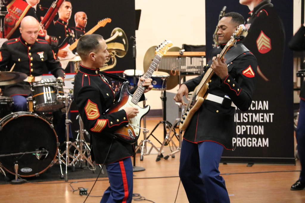 Guitarist play from the Marine Corps band