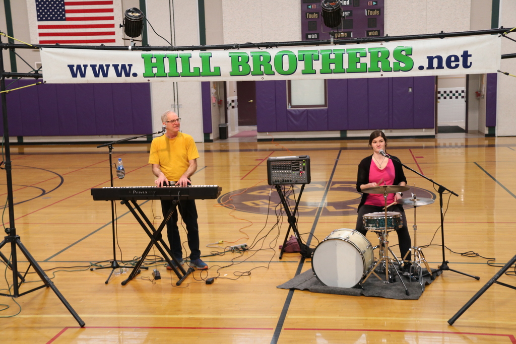 the Hill Brothers perform for students