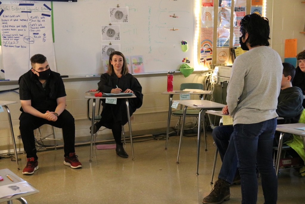 students engage in a mock trial