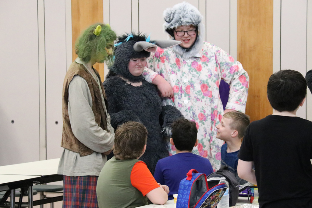 Shrek, Donkey and the Big Bad Wolf talk with students