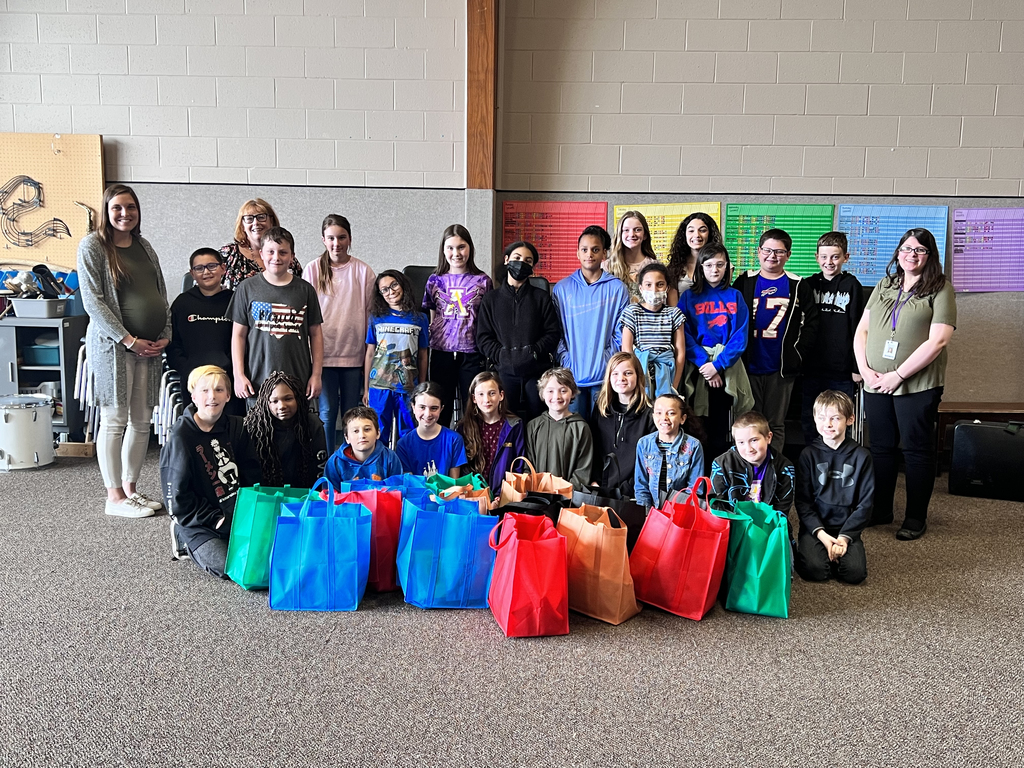 students show off created care bags