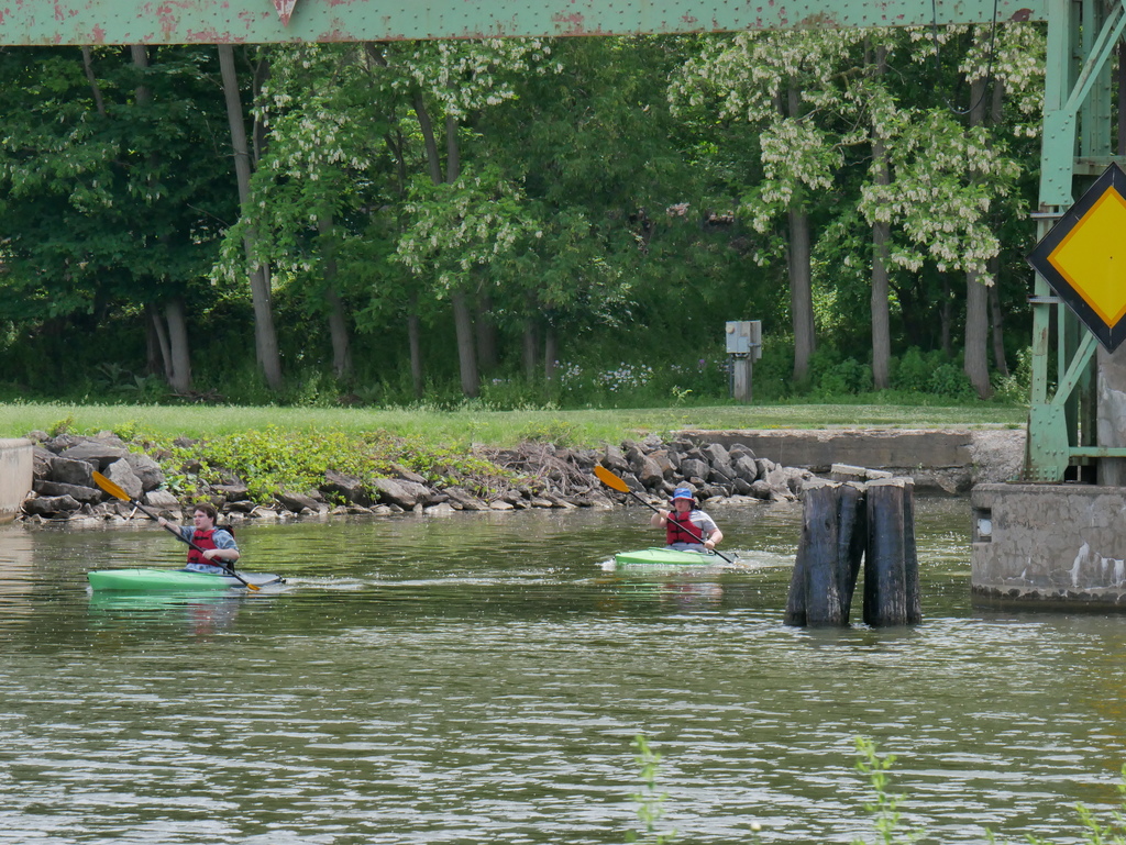 students kayaking on the canal