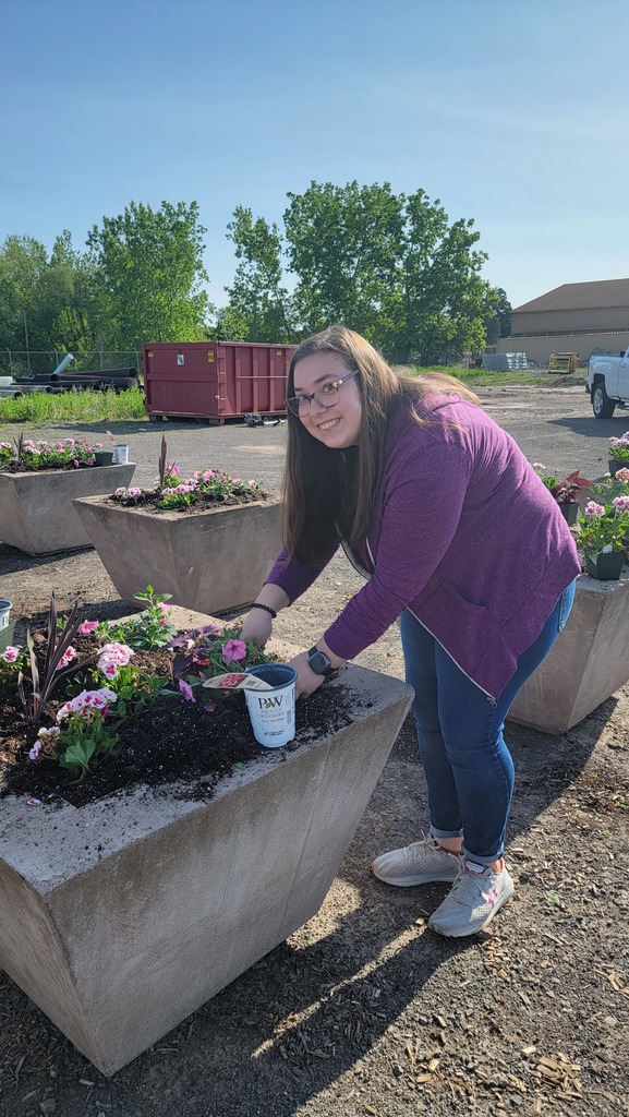 students plant planters