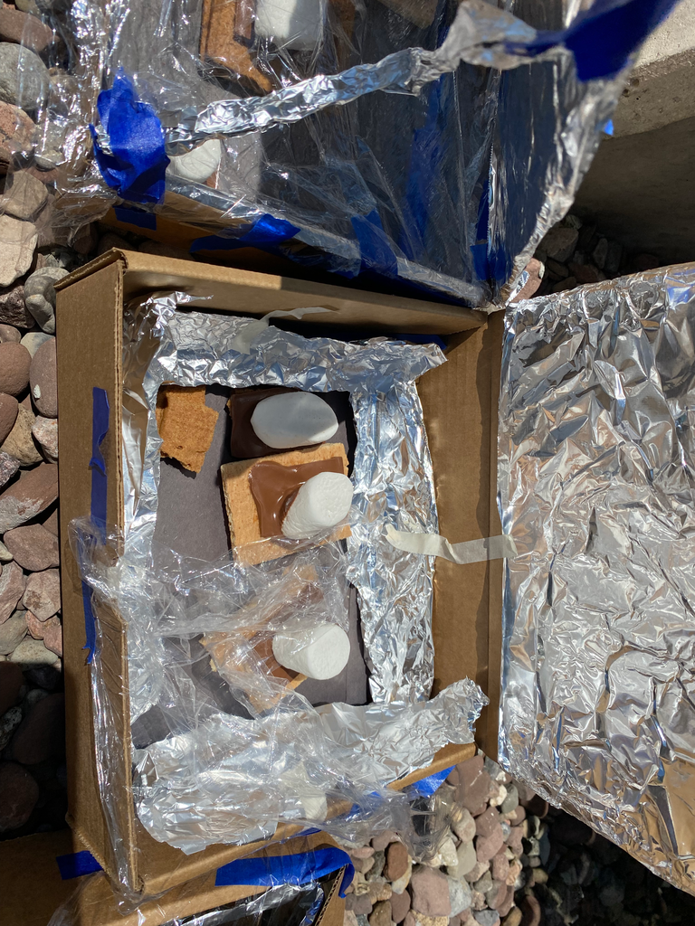 a solar oven cooks s'mores