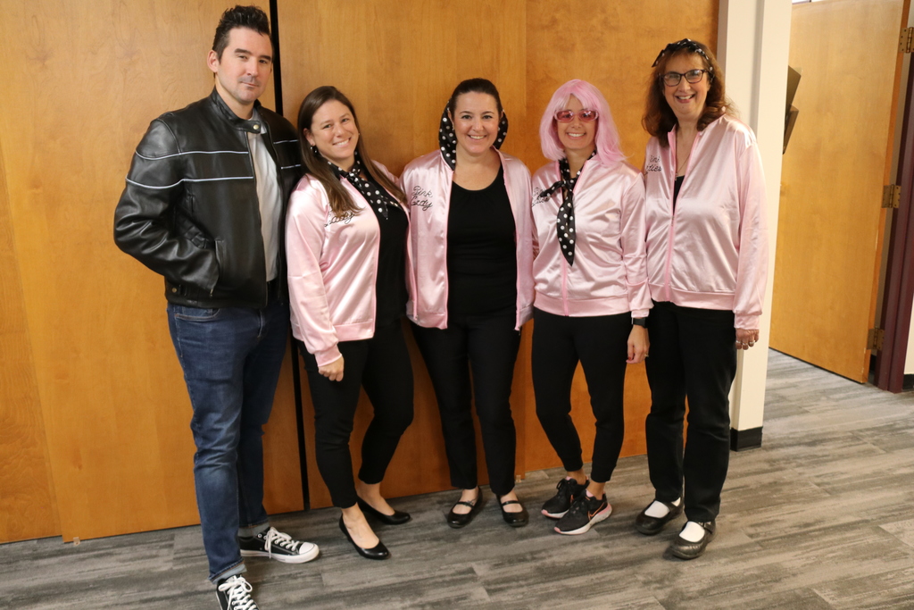 staff dressed as characters from Grease