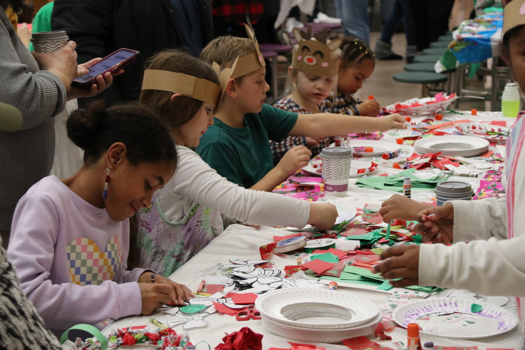 students work on a holiday craft