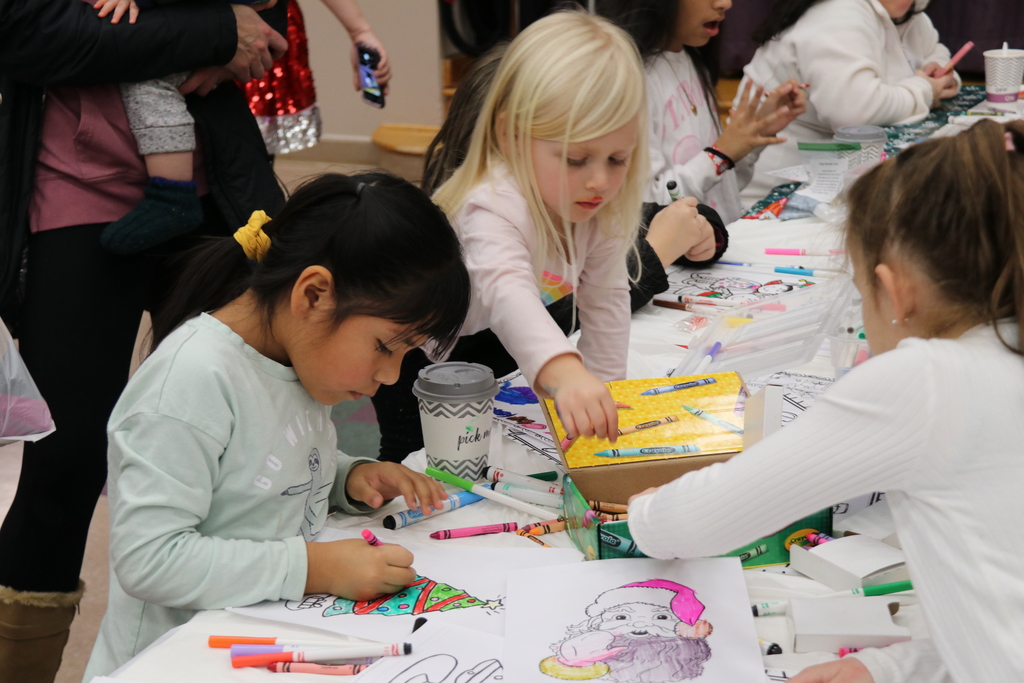 students work on a holiday craft