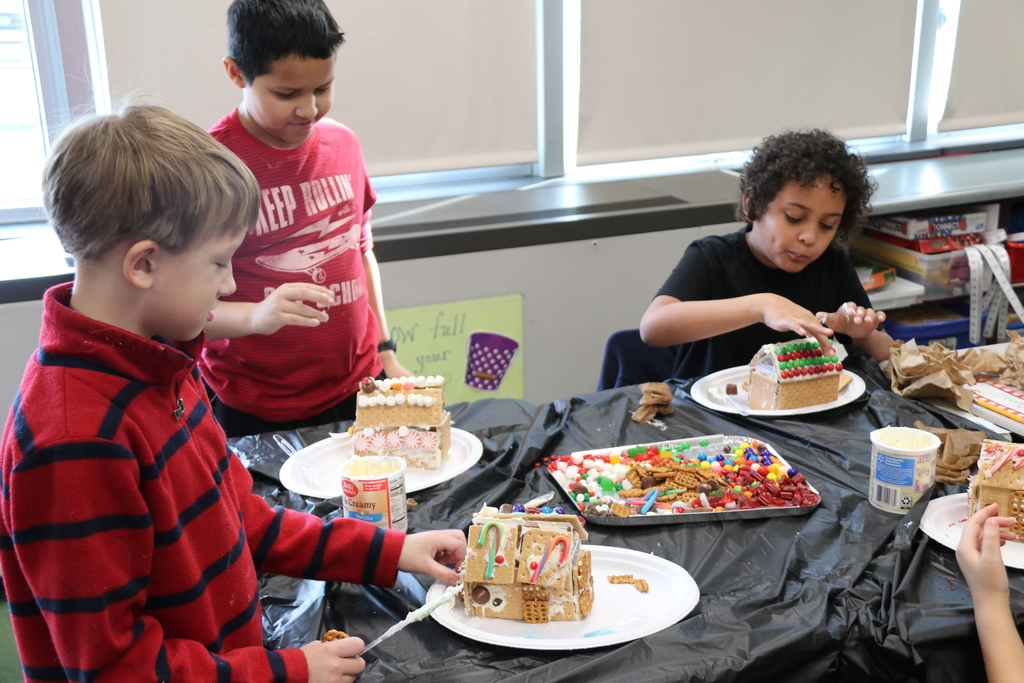 students make gingerbread houses