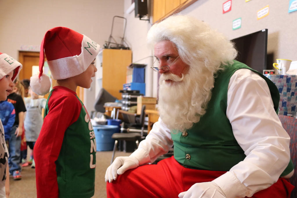 Santa talks with a student