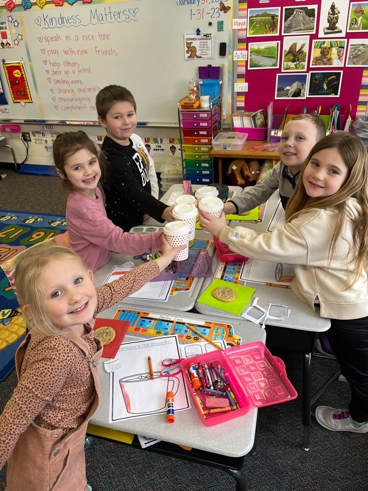 students sharing hot chocolate