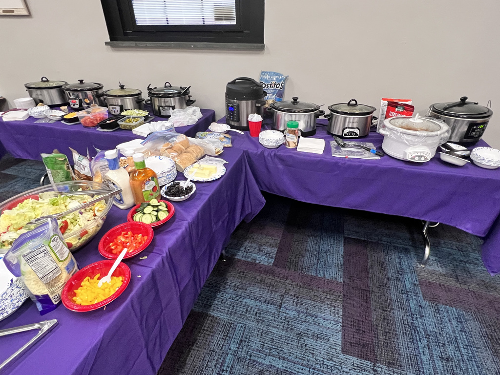tables set up with soup and snacks